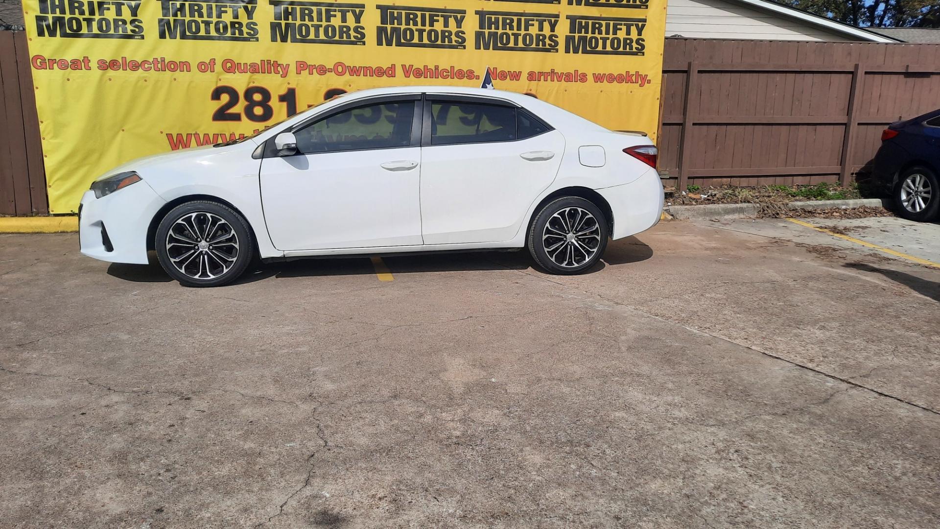 2015 Toyota Corolla (2T1BURHE8FC) , located at 16710 Clay Rd., Houston, TX, 77084, (281) 859-7900, 29.834864, -95.656166 - Photo#0